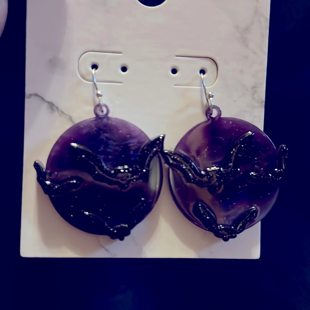 NWT earrings. Black bats on purple back.  Pierced